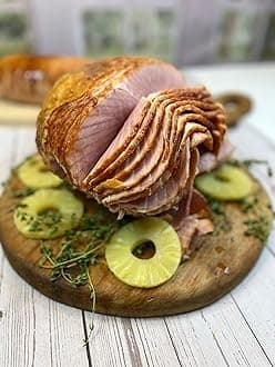 ! HOLIDAY HAM CO. Holiday Honey Glazed Spiral Sliced Gourmet Ham. 7.5-8.5 pounds. Serves 12-14