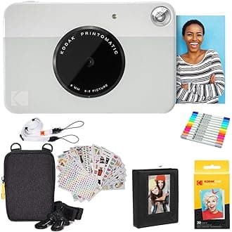 Kodak Printomatic Instant Camera (Grey) Gift Bundle + Zink Paper (20 Sheets) + Deluxe Case + 7 Fun Sticker Sets + Twin Tip Markers + Photo Album + Hanging Frames + Comfortable Neck Strap